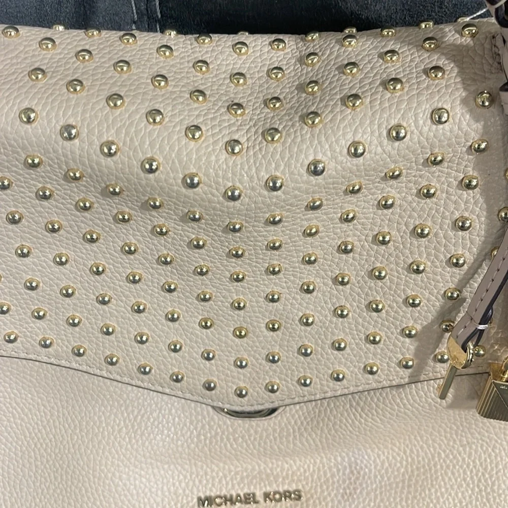 Michael Kors questions leave